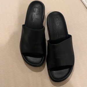 Ecco luxury, never worn, Flowt black wedge slide sandal. size 6.